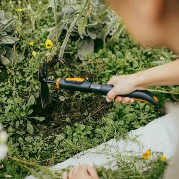 Motyčka dvoustranná Fiskars OneClick